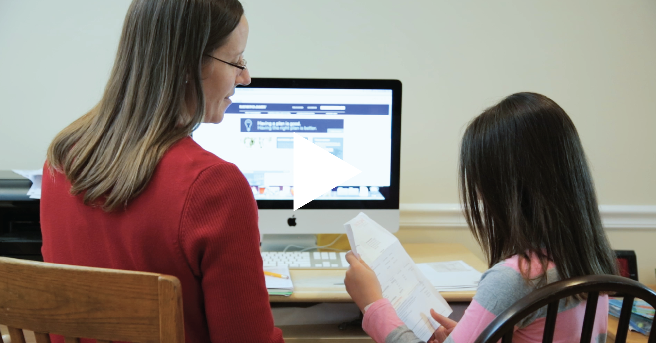 A child learning about retirement from a Meakem professional